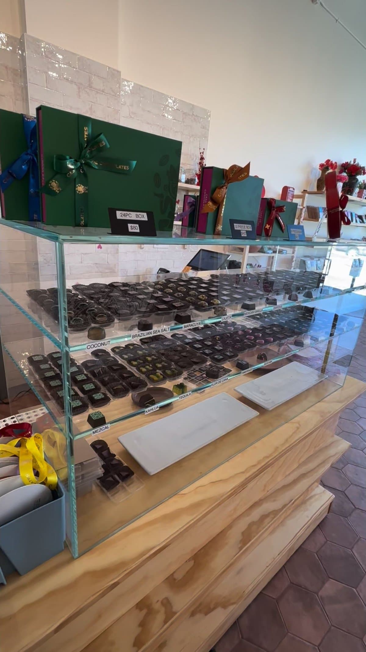 Custom extra-clear glass display case with multiple shelves